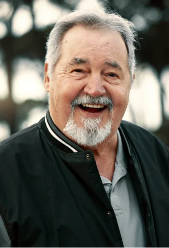 Older man smiling with a restored smile