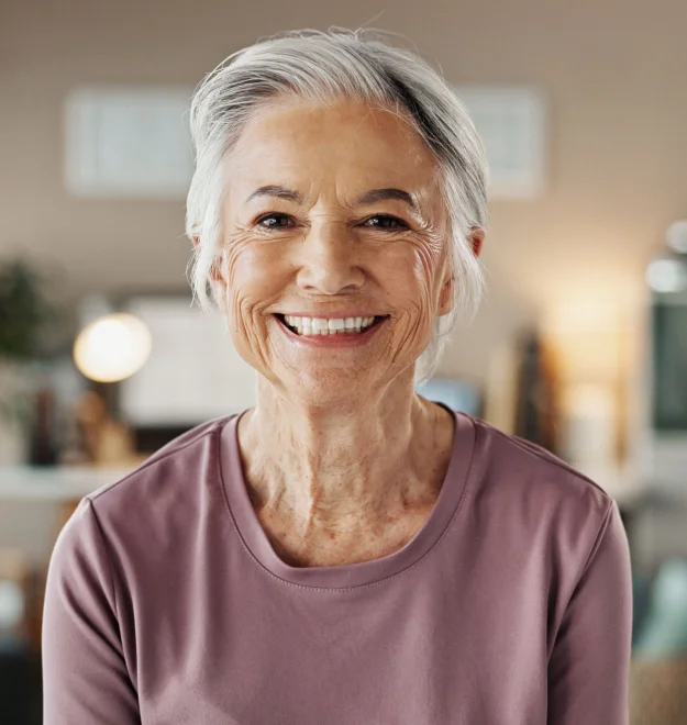 Older woman smiling with a complete smile