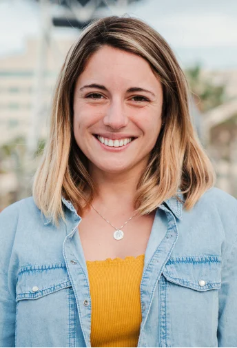 Woman smiling after teeth whitening