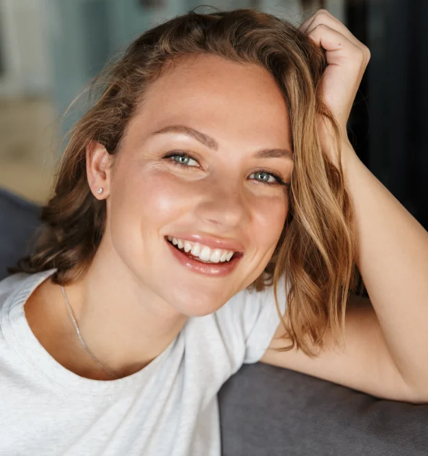 Smiling woman with natural-looking results after Botox treatment