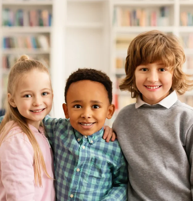Kids smiling together during a friendly dental care visit